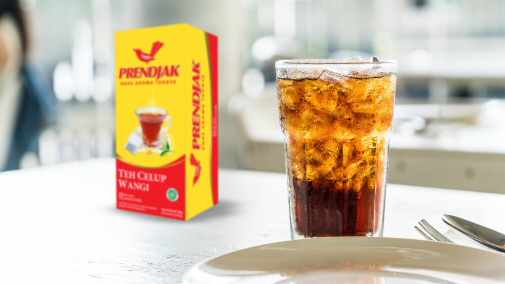 A glass of cold sweet iced tea, a refreshing drink to quench thirst in hot weather
